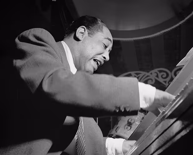 Duke Ellington at the piano.
