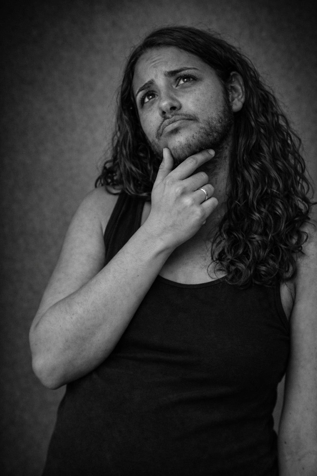 pregnant bearded woman holding her belly and annode