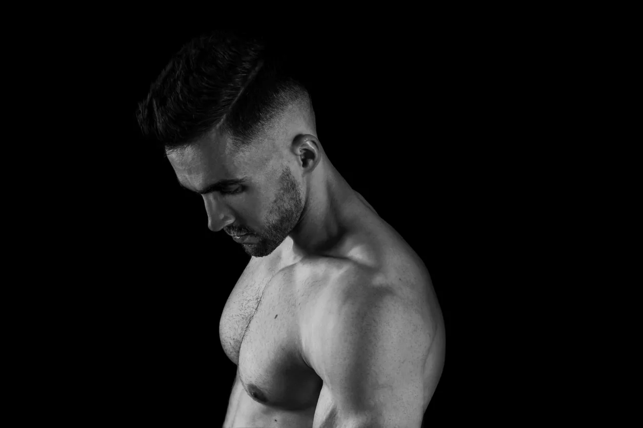 shirtless muscular man standing