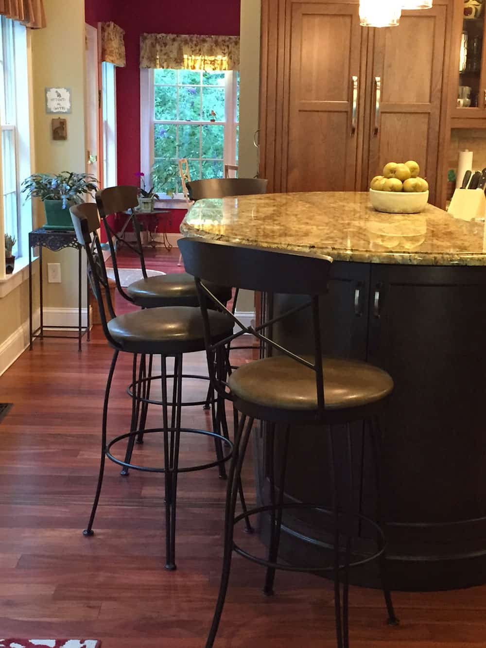 four black kitchen stools