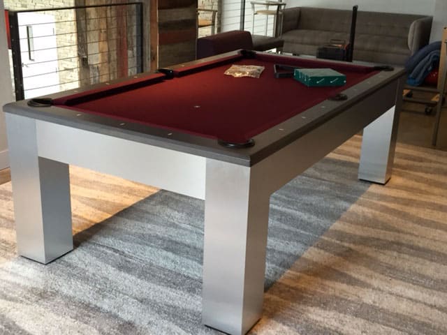 red pool table with chunky legs