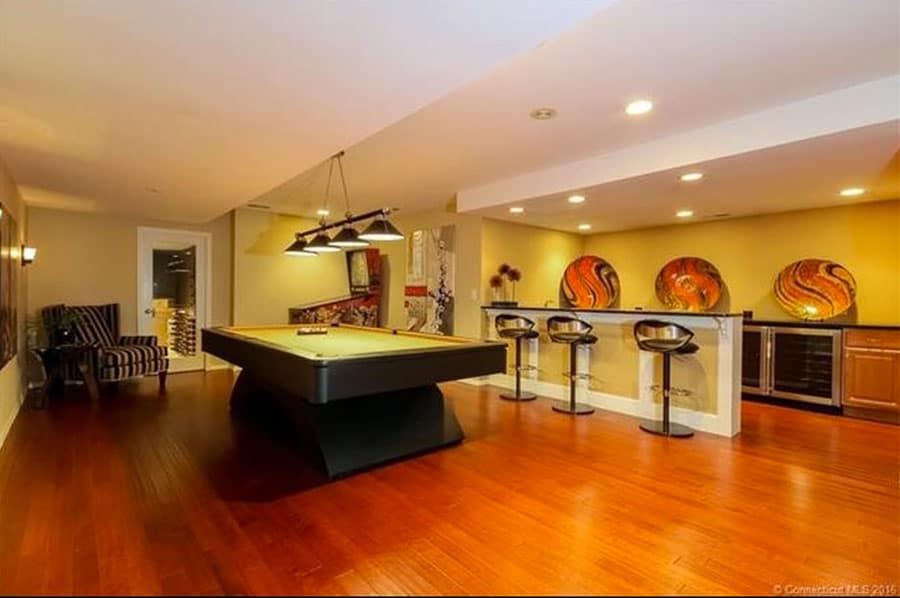 modern pool table with bar stools