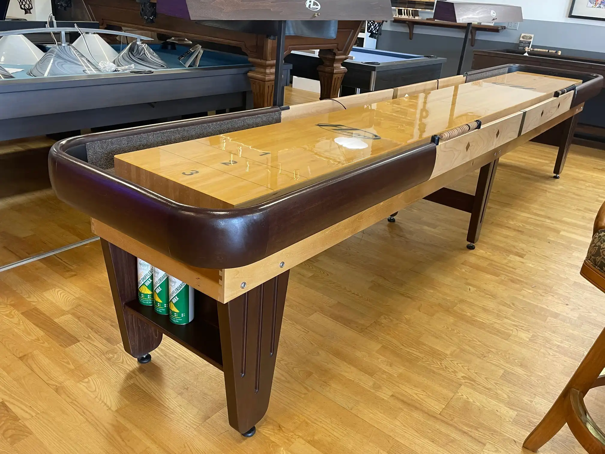 Hudson shuffleboard with wooden surface and scoring zones