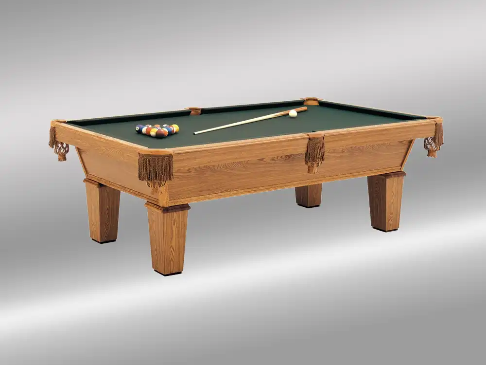 Classic Olhausen Drake pool table in oak finish with green felt, tapered legs, leather fringe pockets, racked balls, and cue on the slate surface.