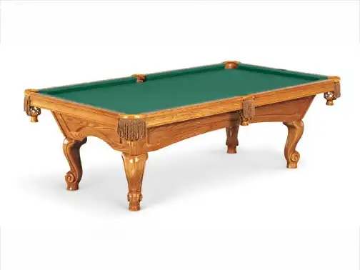 Oak wood billiard pool table with classic, ornate legs, green felt playing surface, and decorative leather pocket fringes.