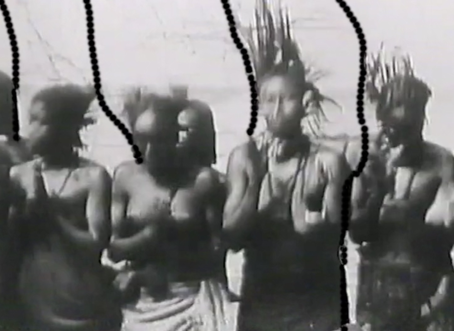 Scene from Specialised Technique, incorporating colonial archival film from the Colonial Film Unit