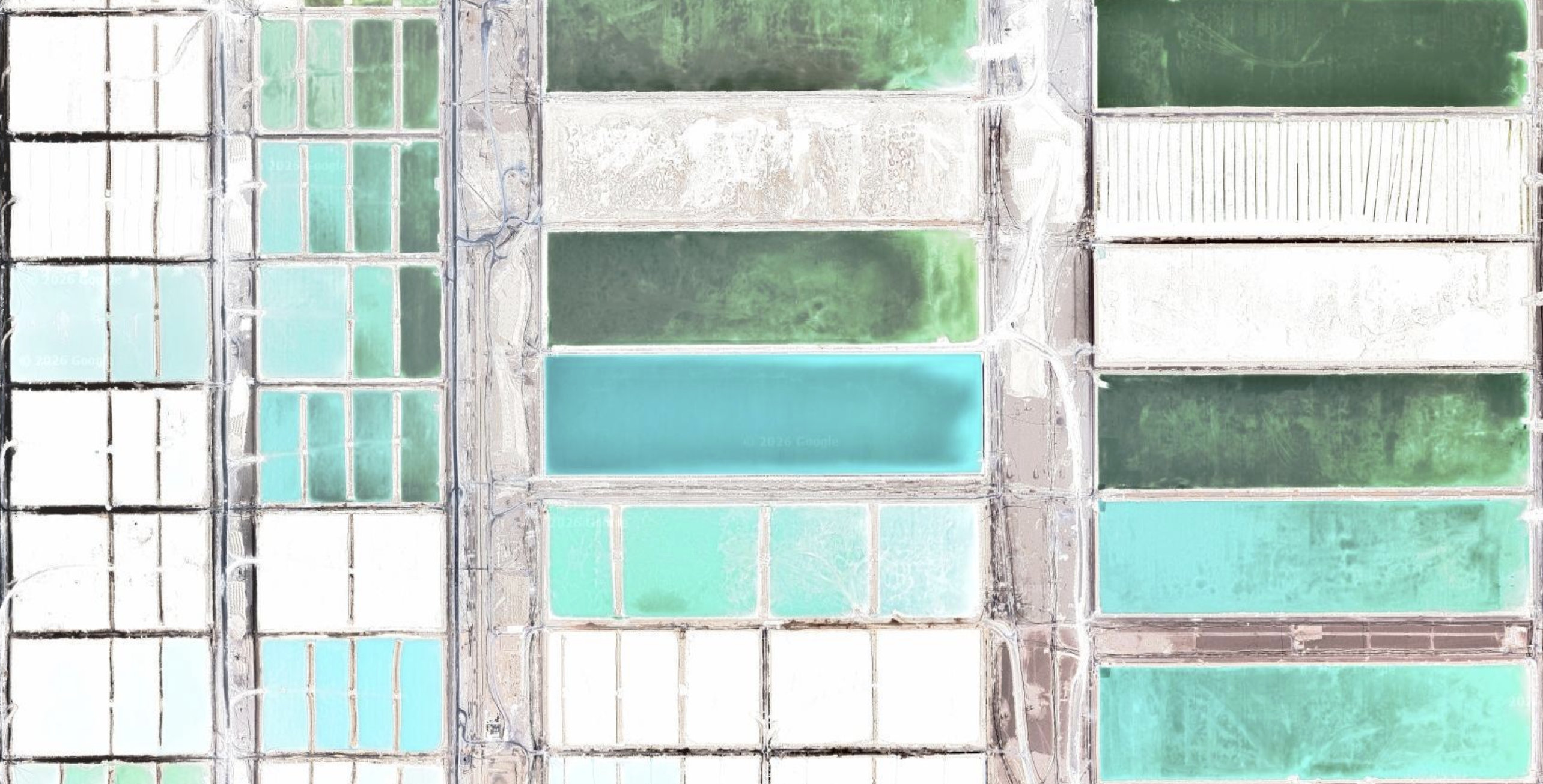View of the evaporation ponds and their chromatic variations.