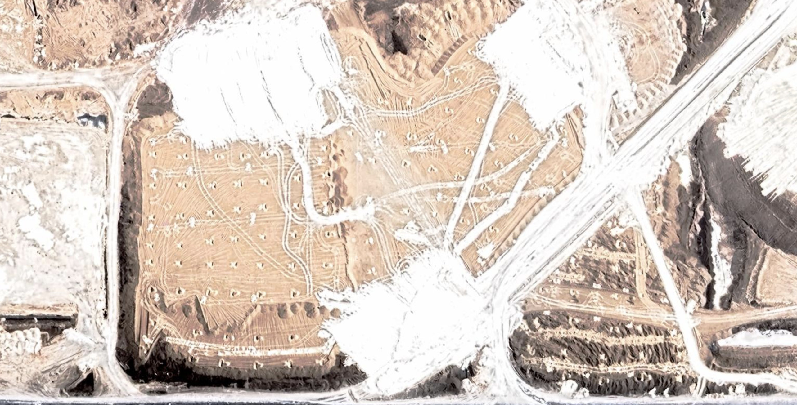 Infrastructural zoom of lithium evaporation ponds in the Salar de Atacama.