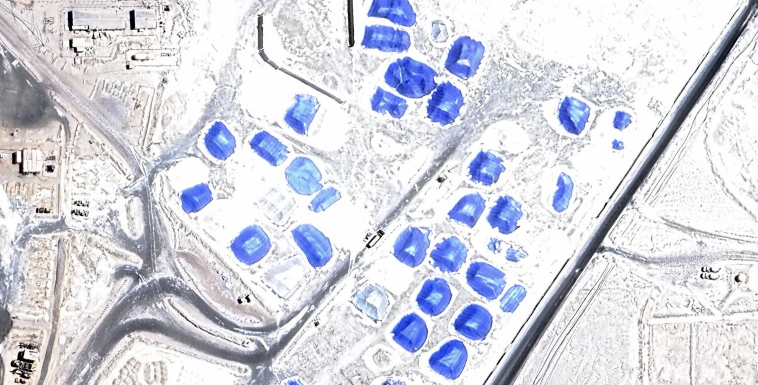 Infrastructural zoom of lithium evaporation ponds in the Salar de Atacama.