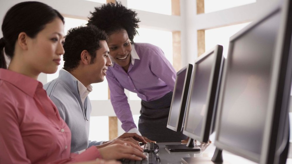 employees watching training videos