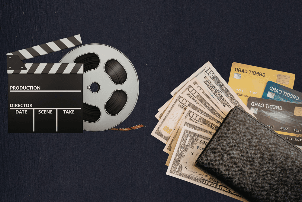A film clapperboard and movie reel next to a wallet filled with cash and credit cards, representing video production costs.