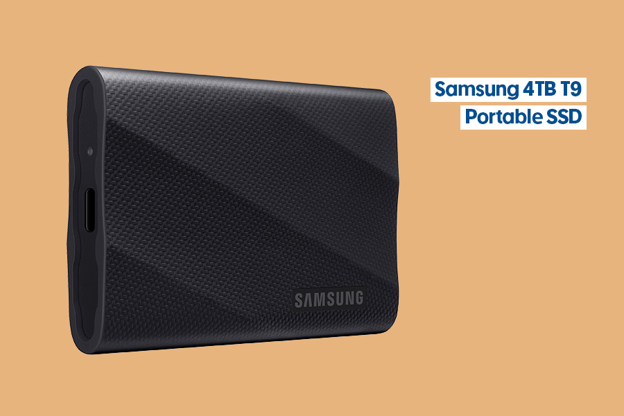 Samsung 4TB T9 Portable SSD with textured black design and USB-C port displayed against a warm beige background.