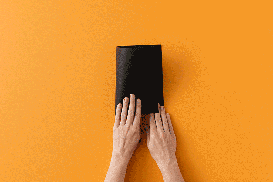 A series of images showing how to make a bandage card for a Halloween craft project for kids.