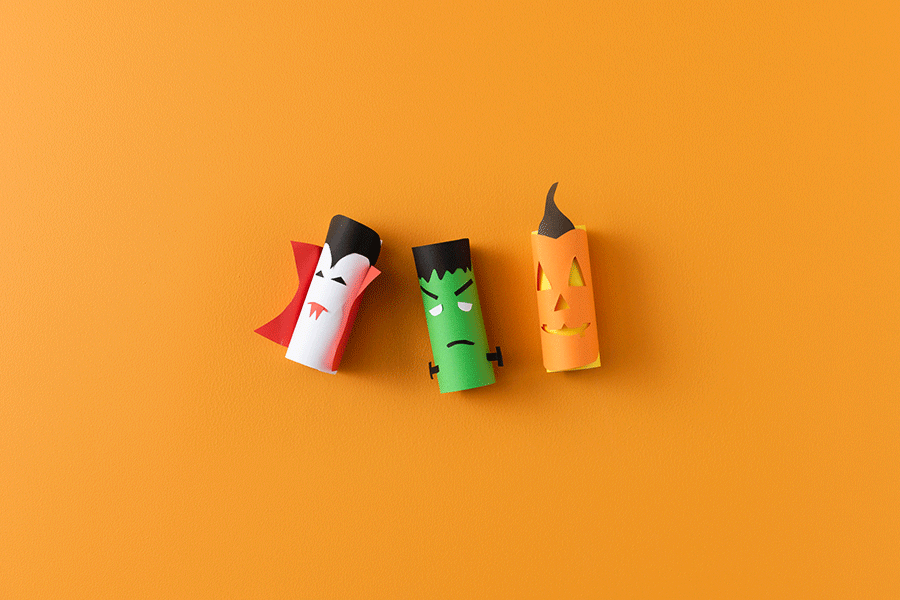 A series of images showing how to make cardboard-roll characters for a Halloween craft project for kids.