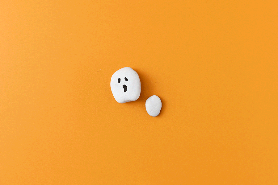 A series of images showing how to make ghostly paperweight rocks for a Halloween craft project for kids.