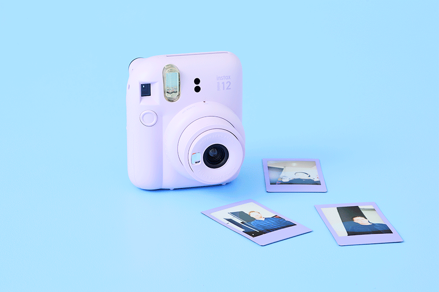 A selection of creative tech gifts, shown on various brightly coloured backgrounds. Products include an instant camera and a craft cutting machine. 