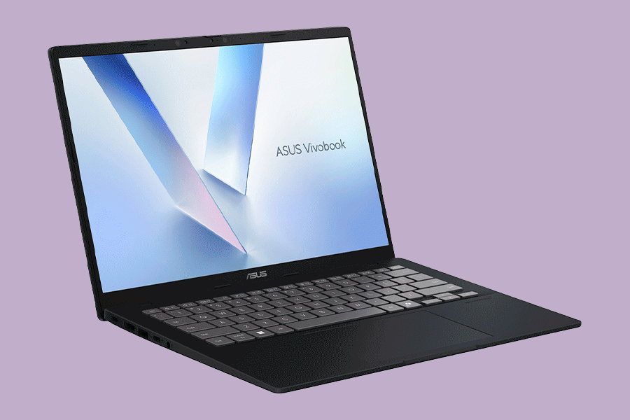  An assortment of AI laptops, shown on various brightly coloured backgrounds.