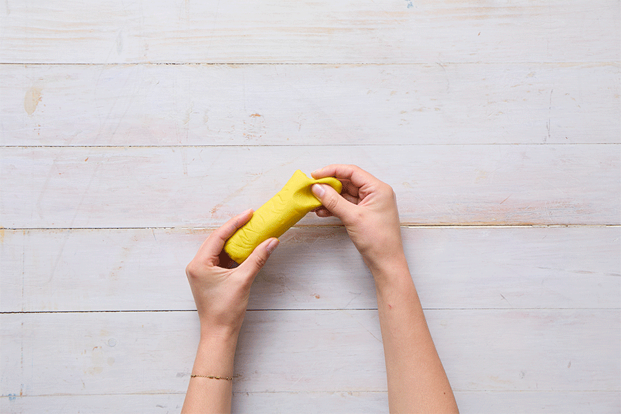 A series of images demonstrating Step 1 of making matchstick structures, showing hands rolling pieces of yellow playdough into small balls.