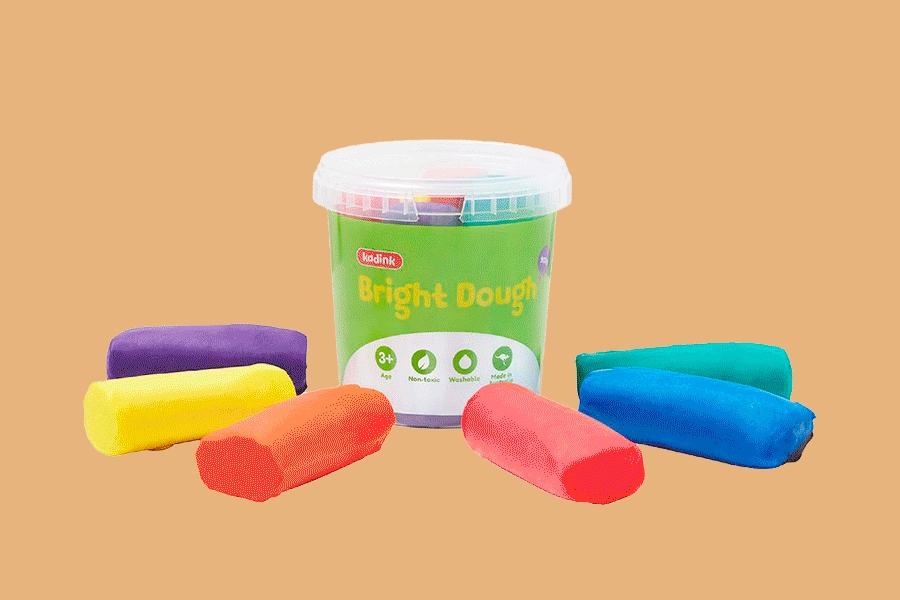 An assortment of learning resources, shown on various brightly coloured backgrounds, including playdough, art paper, building blocks and games.