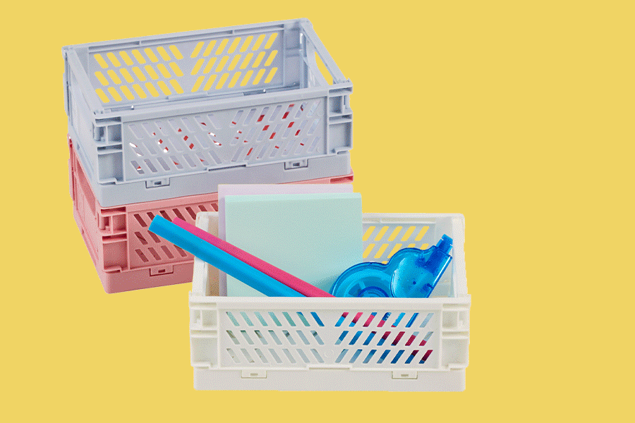 An assortment of stationery supplies to help with organisation shown on various brightly coloured backgrounds. Products include a storage baskets, dividers and a pencil case.