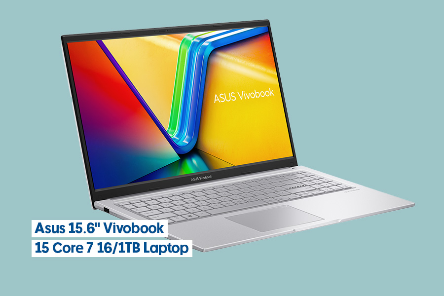 The Asus 15.6-inch Vivobook Core i7 16GB/1TB Laptop shown on a teal background. Features silver casing and keyboard. The screen shows a vibrant rainbow gradient with ASUS Vivobook branding.