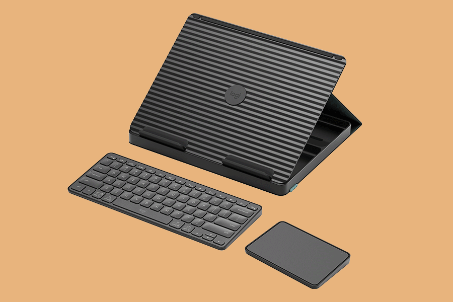 An assortment of on the go work accessories shown on various brightly coloured backgrounds. Products include a mouse and keyboard travel pack, a pop-up desk and earbuds.