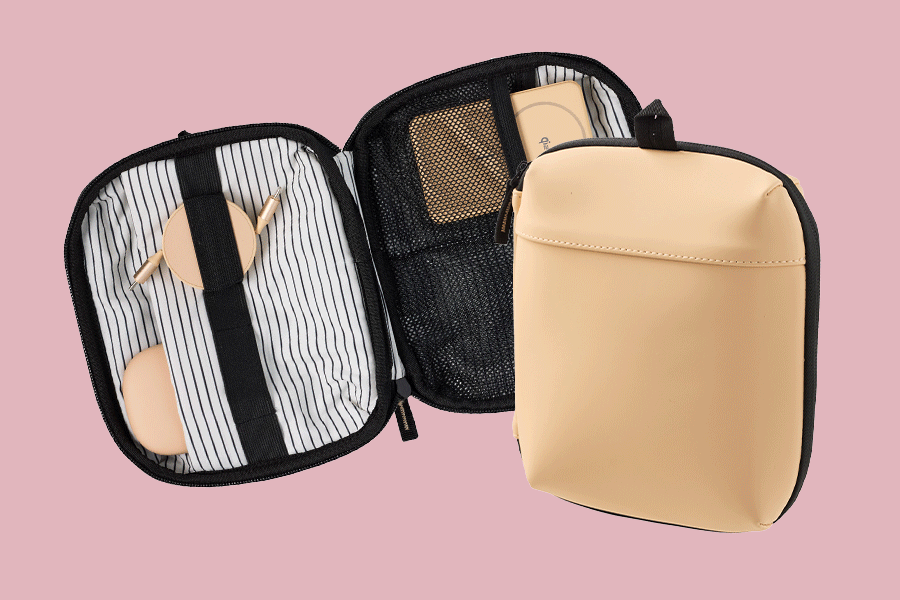 An assortment of travel tech shown on various brightly coloured backgrounds. Products include a tech organiser and a retractable USB-C cable.