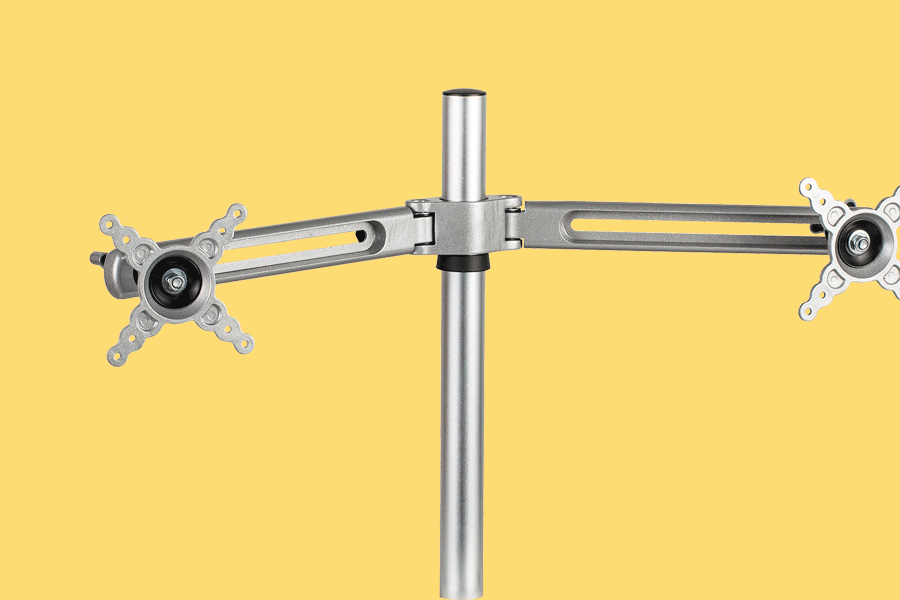 An assortment of products to help with creating a dual monitor setup, shown on various brightly coloured backgrounds. Products include things like powerboards, monitor arms and monitor stands.