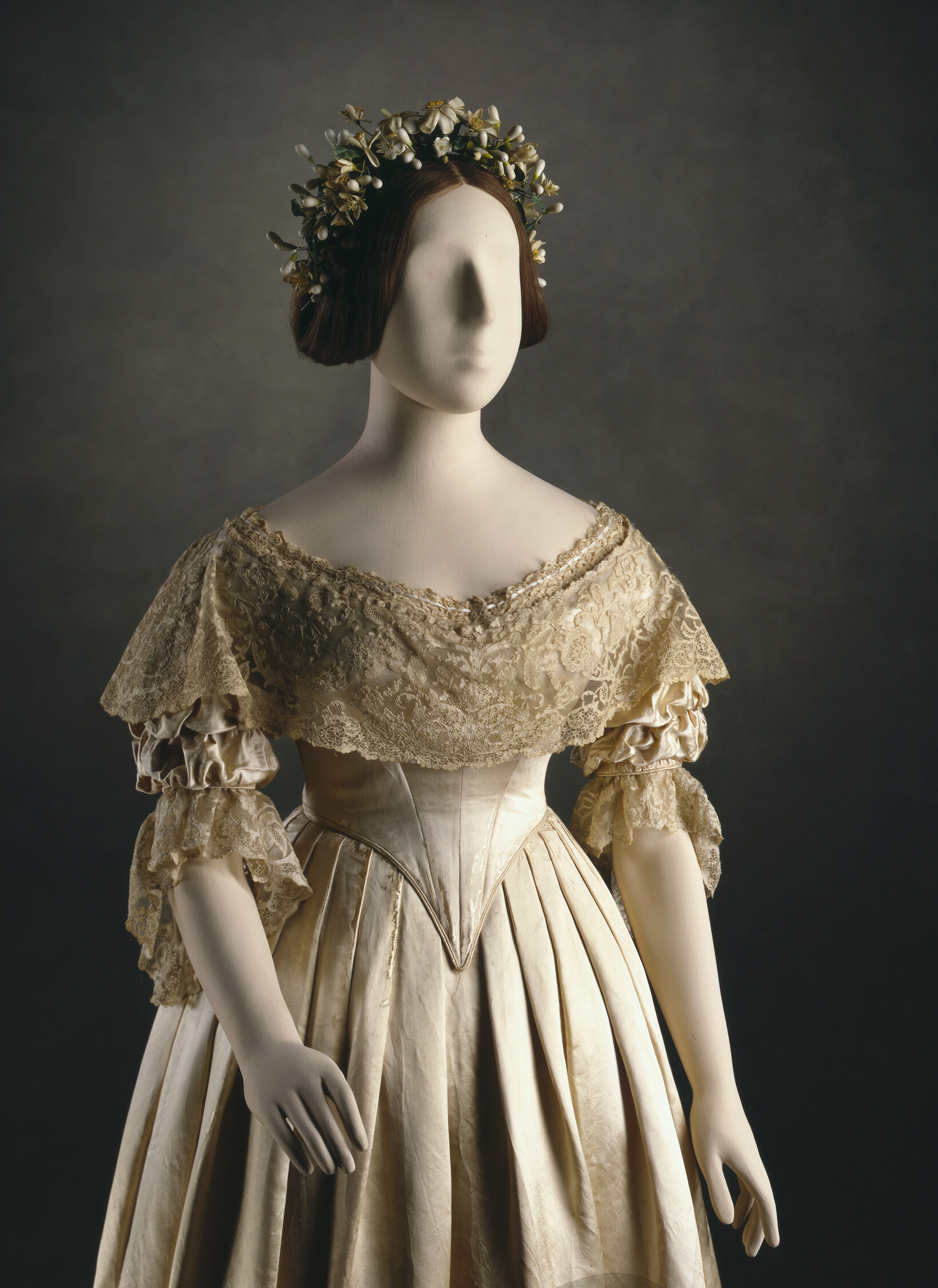 Mary Bettans (English). Queen Victoria's wedding dress, 1840. Spitalfields silk, honiton lace. London: The Royal Collection Trust, RCIN 71975. Source: The Royal Collection Trust.