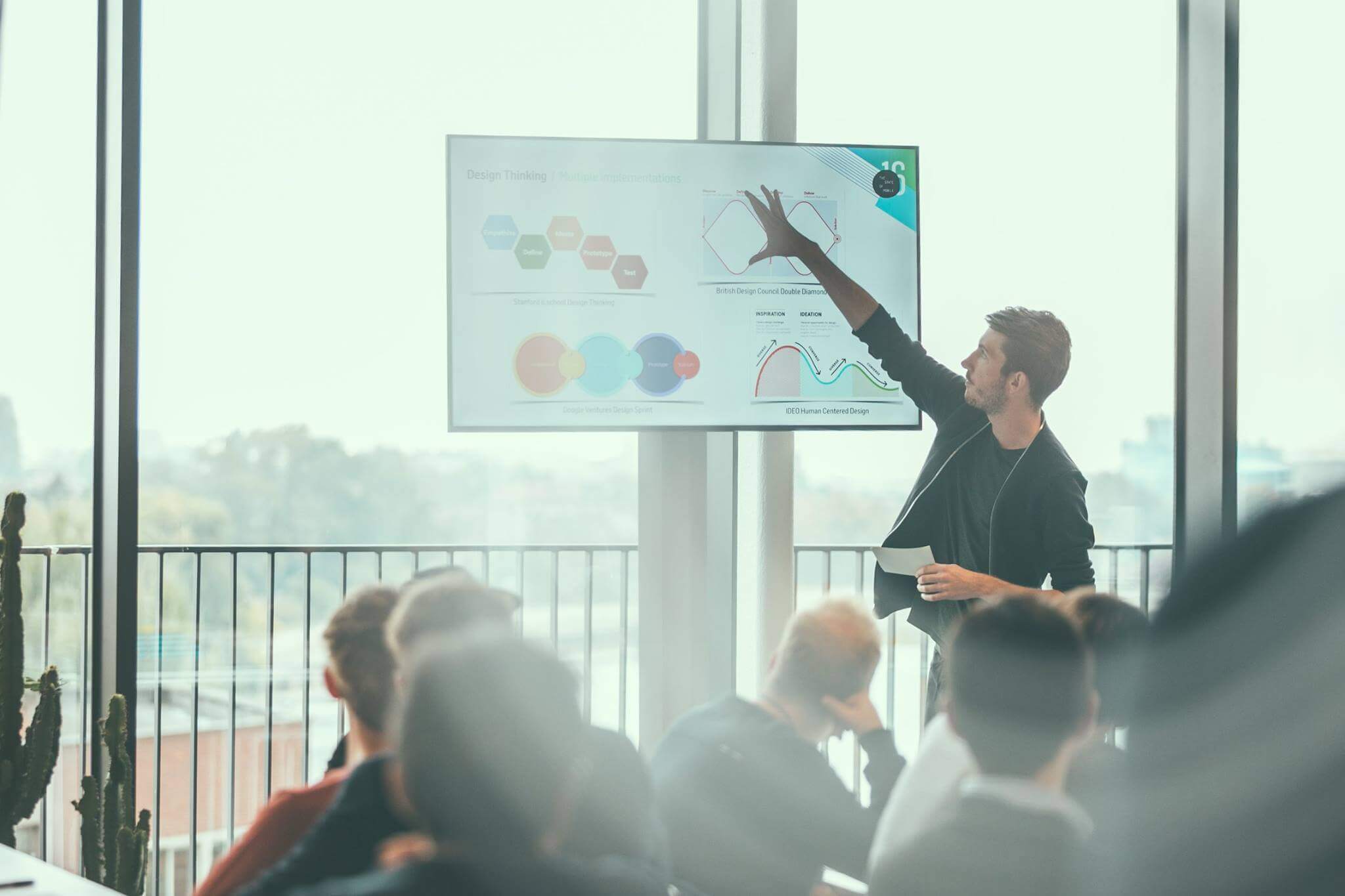 Hannes presenting the first step of Design Thinking