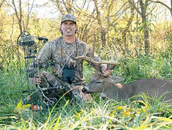 A man with a deer.