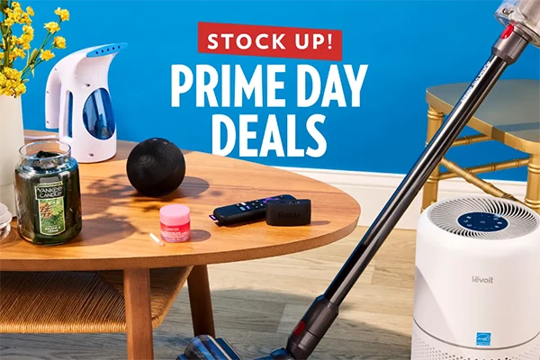 Items on a table, a vacuum, and an air purifier.