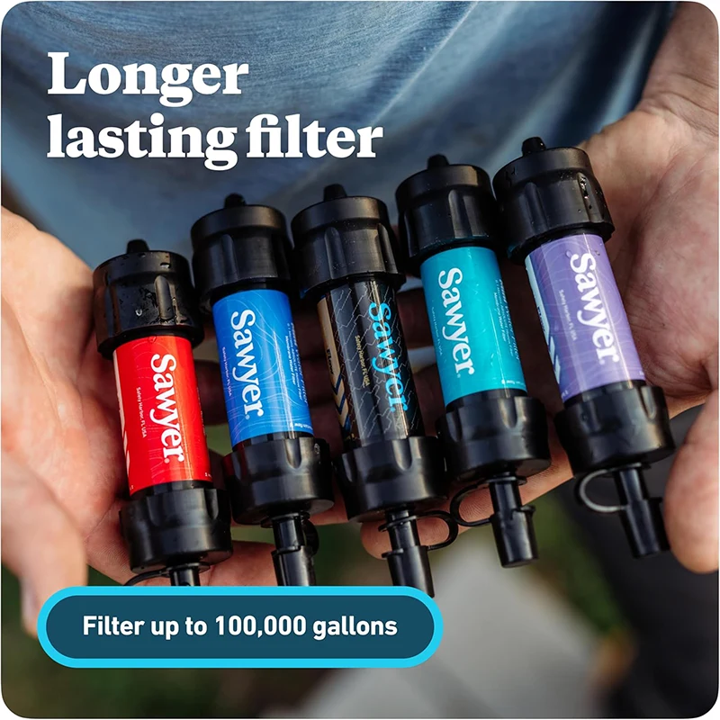 Person holding five multi-colored Sawyer mini filters in hand with text reading "Longer lasting filter" and "Filter up to 100,000 gallons