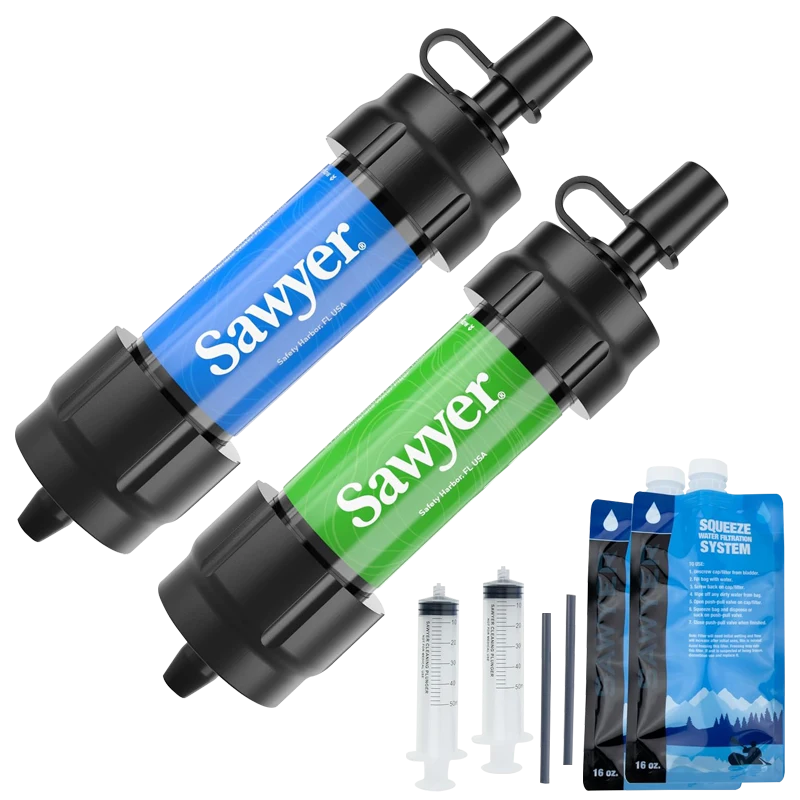 Two Sawyer mini water filters, green and blue, with two squeeze pouches, two straws and two cleaning plungers