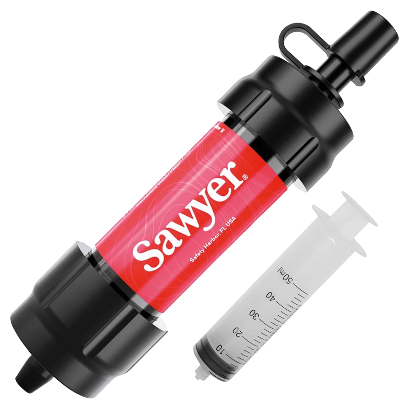 A single red Sawyer mini water filter with a cleaning syringe