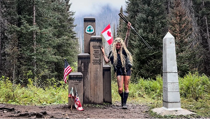 Liz Kidder at the Northern Terminus of the Pacific Crest Trail.