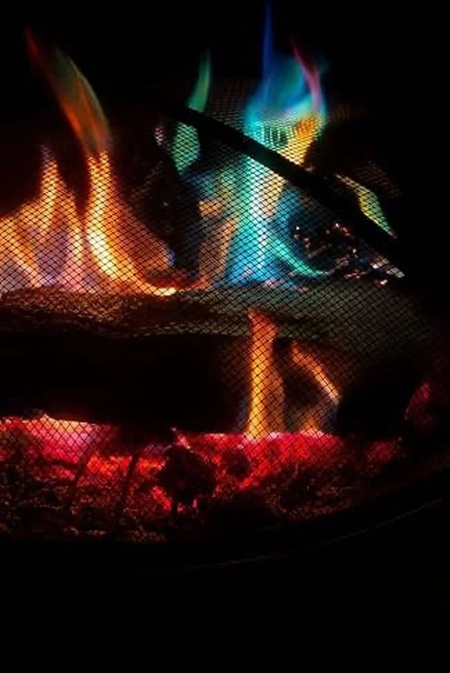 Colorful flames in a campfire.