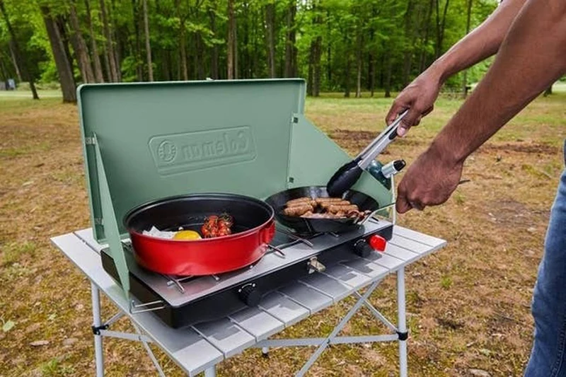 A Coleman two-burner camping stove.