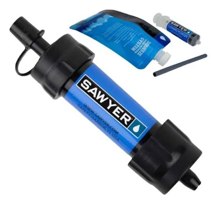 Sawyer water filtration system components including a blue filter unit, a squeeze pouch, a cleaning syringe, and a black drinking straw.