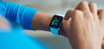 A person is checking the information on Apple Watch