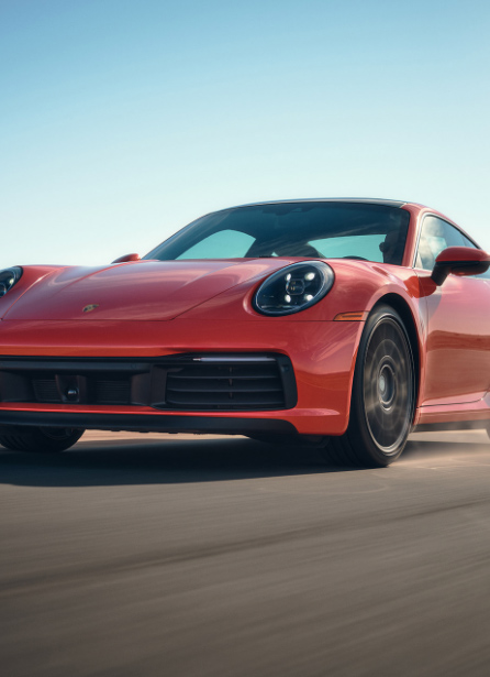 Red Porsche moving fast