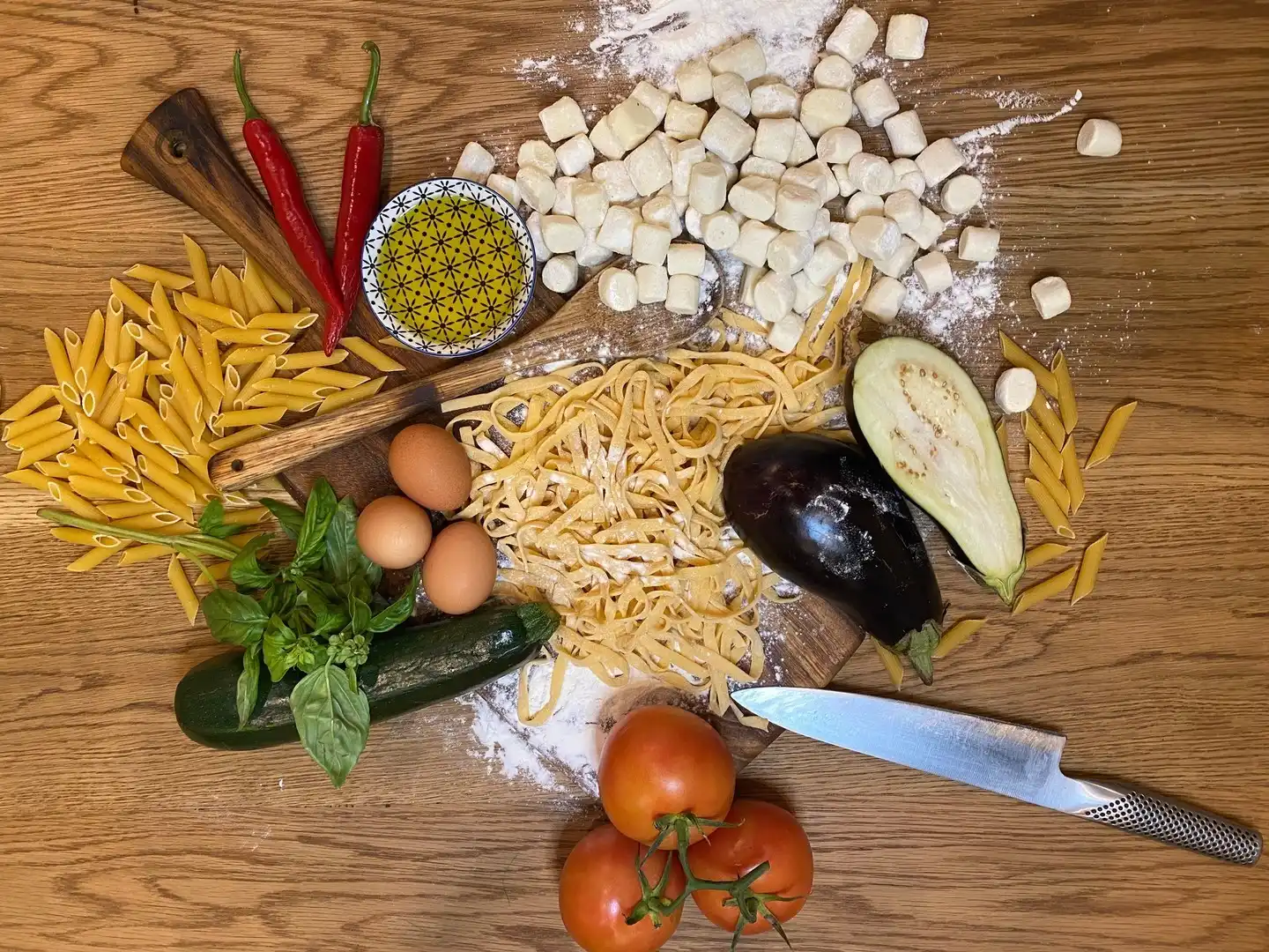 Fresh pasta ingredients on a wooden board