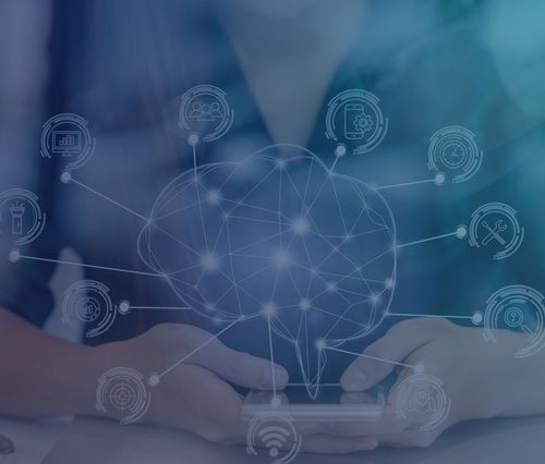 Professional woman in plaid shirt using smartphone with digital brain overlay connecting to various icons representing AI technologies and functionalities in learning and development
