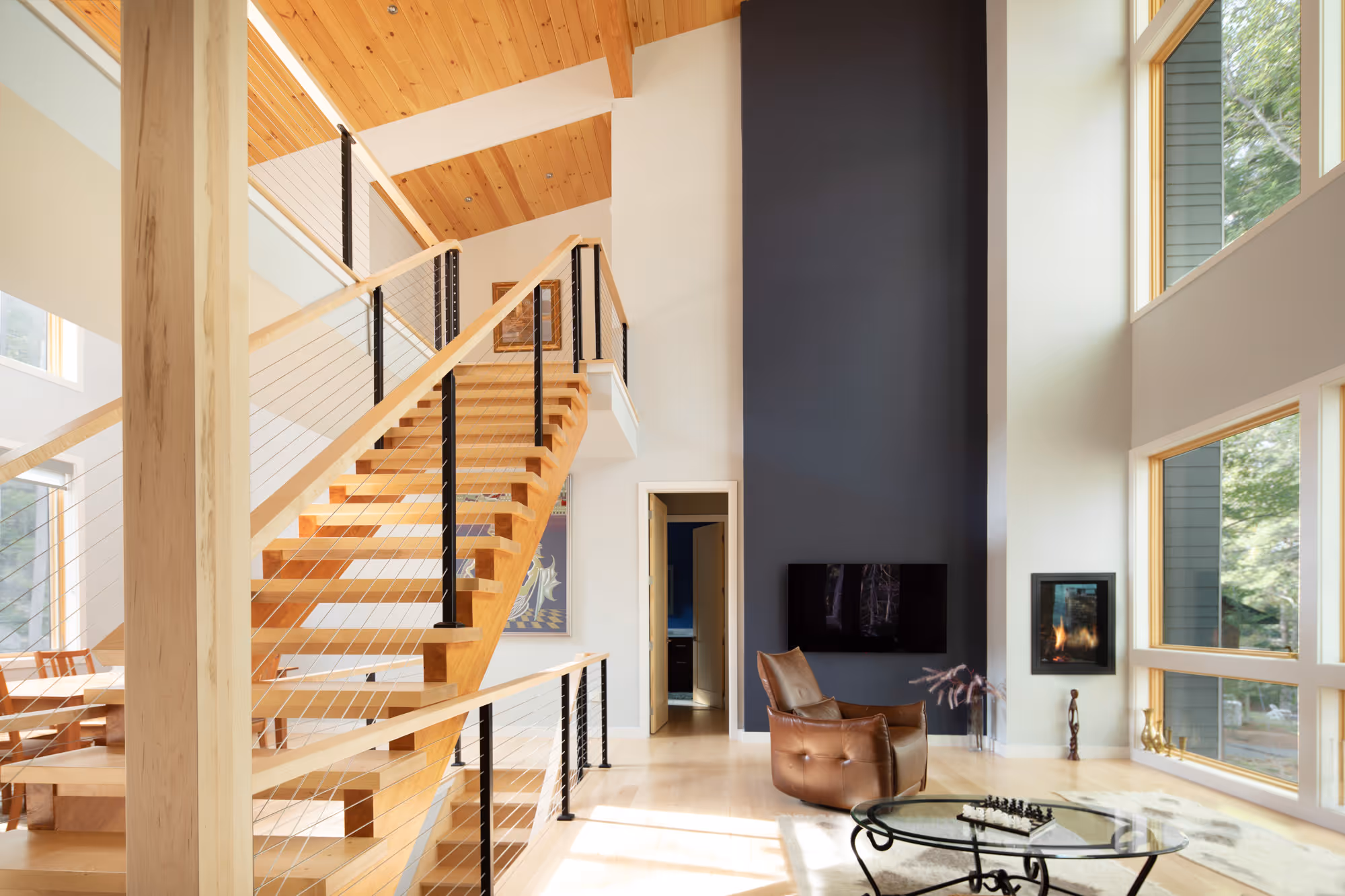 Wittemore Cove interior with staircase and fireplace