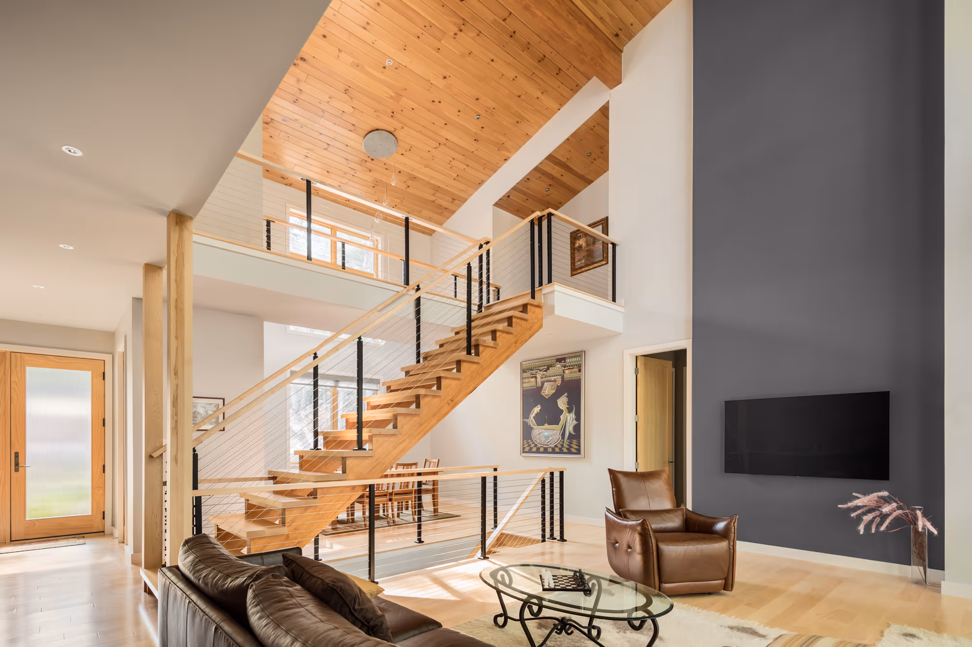 Wittemore Cove interior with staircase, fireplace, and living room