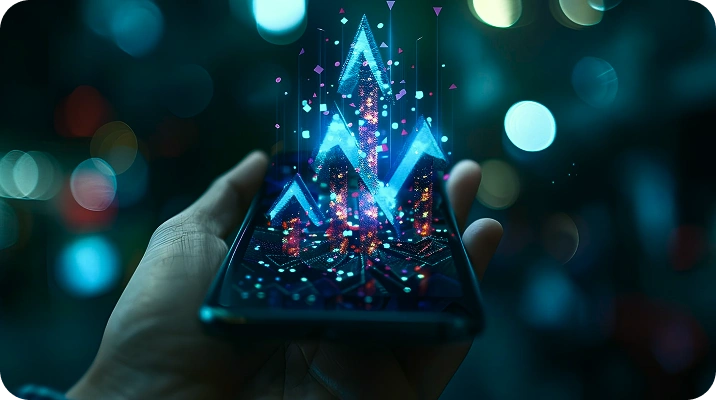 Hand holding smartphone projecting glowing blue upward-trending arrows representing data growth.