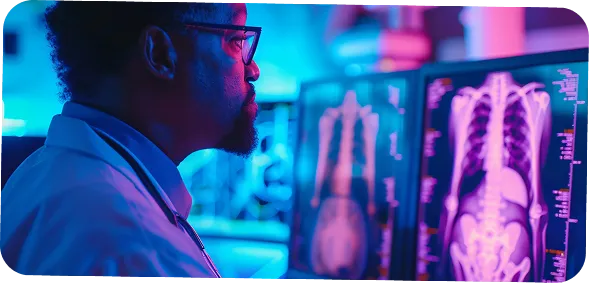 Doctor reviewing digital scans on monitor using ai data security systems