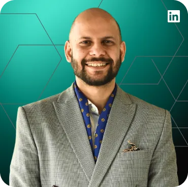 Professional headshot of Mujtaba Sheikh, AI-First Solution Architect & Fractional CTO.