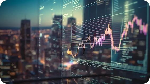 Candlestick graphs on a screen representing trade and market data platforms