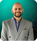 Professional headshot of Mujtaba Sheikh, AI-First Solution Architect & Fractional CTO.